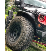 Dynamic Black Oracle LED Headlights on Jeep in Grass