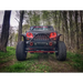 Oracle 7in High Powered LED Headlights - Black Bezel in a dynamic forest setting.