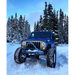 Blue jeep parked in snow with Oracle 7in High Powered LED Headlights - dynamic color.