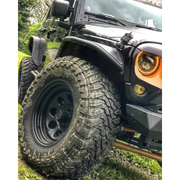 Dynamic Oracle 7in Black LED Headlights with Mud Tires on Jeep