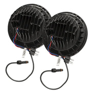 Black round LED fog lights for Jeep displayed in Oracle 7in High Powered LED Headlights - Black Bezel - Dynamic.
