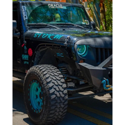 Blue and black decal on dynamic LED Jeep with Oracle 7in headlights