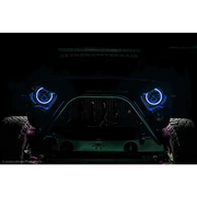 Black car with blue dynamic LED headlights.