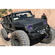 Black Jeep with Big Tire featuring Oracle 7in High Powered LED Headlights in Dynamic Black Color