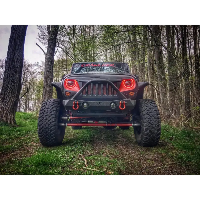 7in High Powered LED Headlights on Jeep Wrangler parked in woods