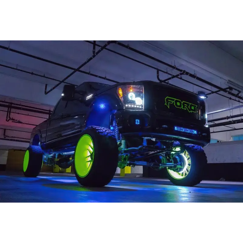 Black truck with yellow wheels and green rim - Oracle Bluetooth + RF Underbody Rock Light Kit - ColorSHIFT