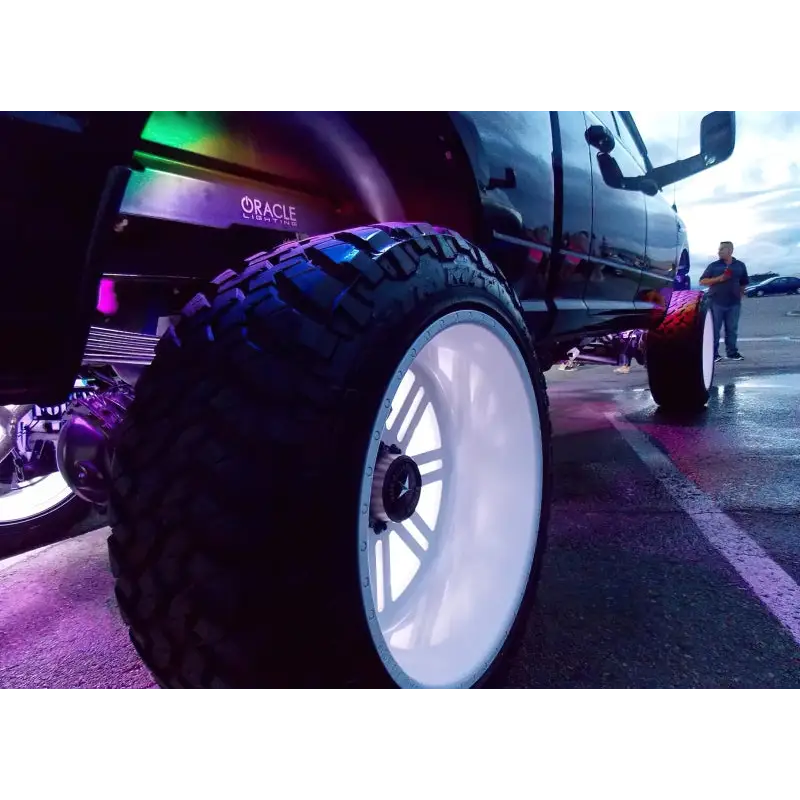Truck with big wheel and tire from Oracle Bluetooth RF Underbody Rock Light Kit