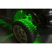 ColorSHIFT rock light kit bright green glow on truck.