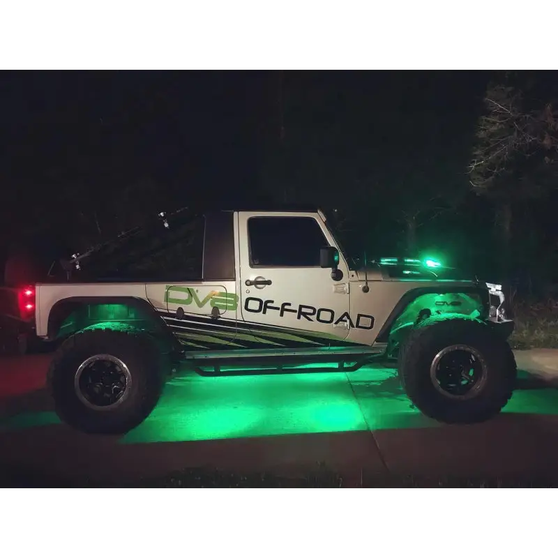 ColorSHIFT rock light kit on white Jeep with green lights