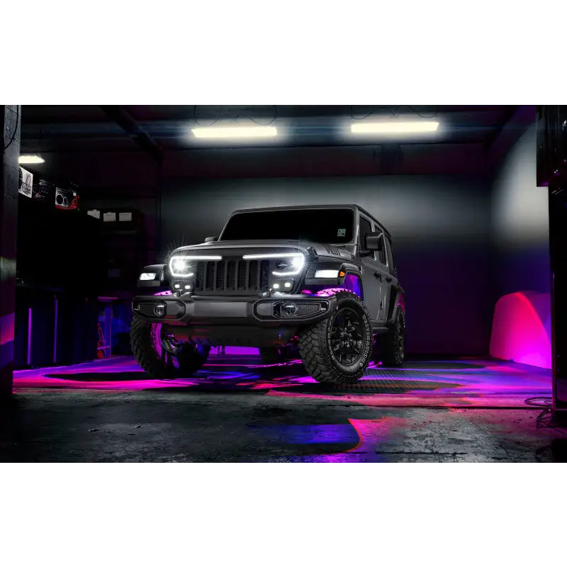 Oracle ColorSHIFT rock light kit with purple light on Jeep