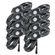 4 pack of ColorSHIFT LED rock lights for outdoor lighting.