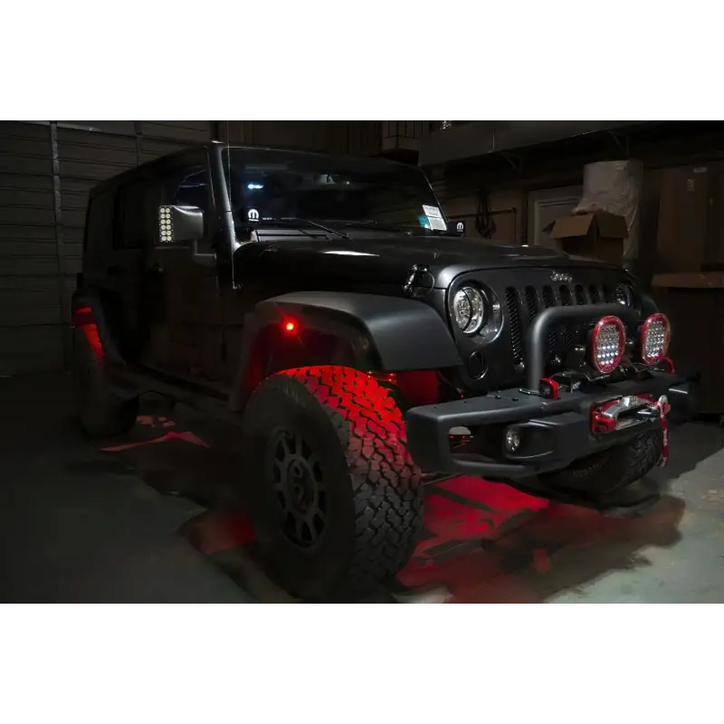 Jeep with red LEDs on it featuring Oracle Bluetooth + RF Underbody Rock Light Kit - ColorSHIFT.