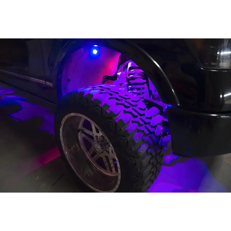 Black car with purple LED rock light kit, Oracle Bluetooth + RF Underbody Rock Light Kit - 8 PCS - ColorSHIFT.