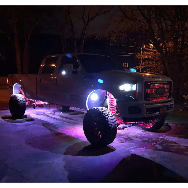 Oracle Bluetooth + RF Underbody Rock Light Kit - 8 PCS - ColorSHIFT - truck with lights on and truck in background.