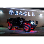 Black Jeep with red LEDs and white Oracle sign - Oracle Bluetooth + RF Underbody Rock Light Kit - 8 PCS - ColorSHIFT.