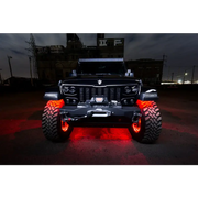 Jeep with red LED rock lights from Oracle Bluetooth + RF Underbody Rock Light Kit.