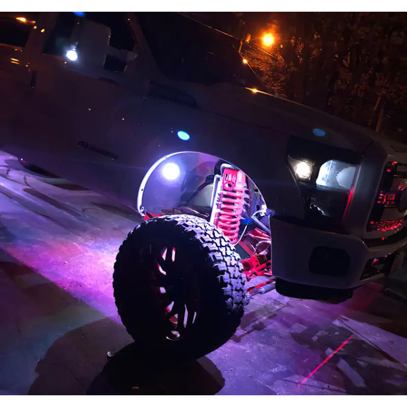 Truck with large tire parked on street - Oracle Bluetooth + RF Underbody Rock Light Kit - 8 PCS - ColorSHIFT