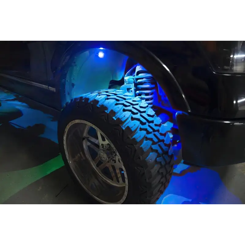 Blue LED rock light kit on black truck - Oracle Bluetooth + RF Underbody Rock Light Kit