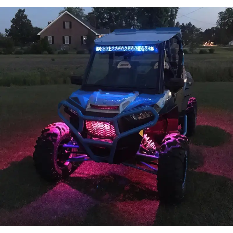 Blue and pink rock light kit with lights on for Oracle Bluetooth + RF Underbody Rock Light Kit.