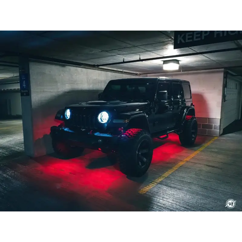 Oracle Bluetooth + RF Underbody Rock Light Kit - 8 PCS - ColorSHIFT in parking lot with red lights