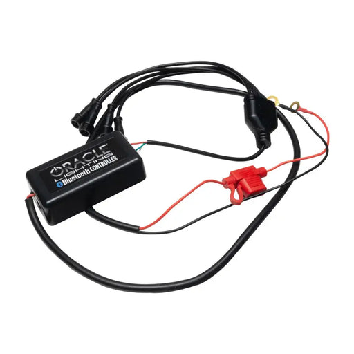 Black and red battery charger with wires and red wire for Jeep Wrangler ColorSHIFT Wheel Ring Controller.