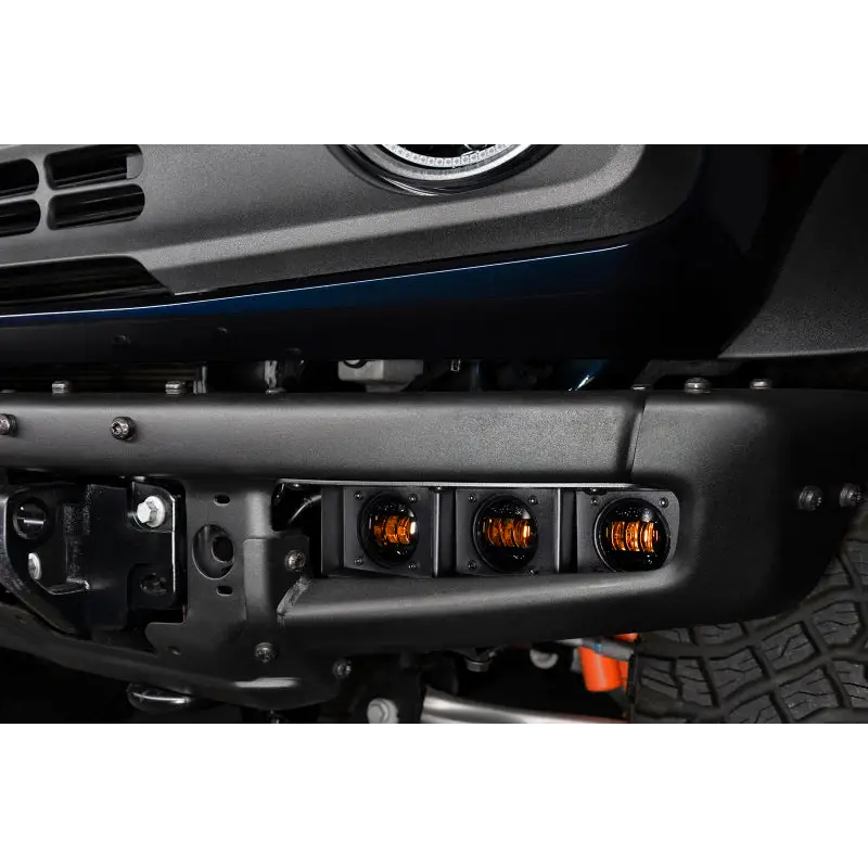 Jeep front bumper mount with fog light kit.