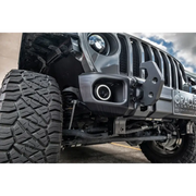 Close up of Oracle Jeep Wrangler JK/JL/JT High Performance W LED Fog Lights on road with big tire.