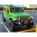 Oracle Jeep Wrangler JK/JL/JT High Performance W LED Fog Lights parked next to green Jeep.