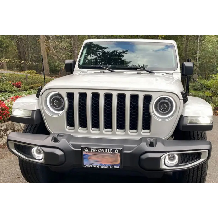 White Jeep with black bumper - Oracle Jeep Wrangler high performance LED fog lights.