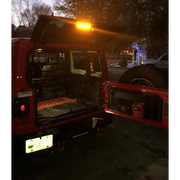 Oracle Jeep Wrangler JL cargo LED light module with red truck in amber/white LED light.