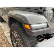 Close-up of Oracle Jeep Wrangler JL Smoked Lens LED Front Sidemarkers car tire and bumper