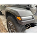 Close-up of Oracle Jeep Wrangler JL Smoked Lens LED Front Sidemarkers car tire and bumper