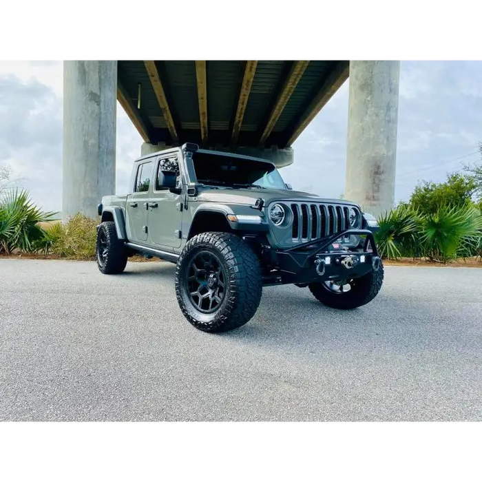 Smoked lens LED sidemarkers on Oracle Jeep Wrangler JL parked under bridge with dog in back seat