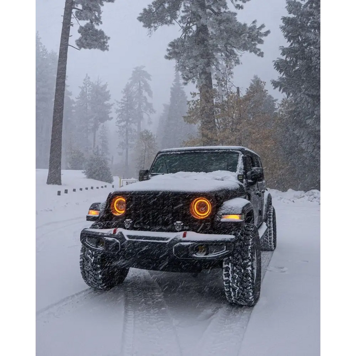 Oracle Jeep Wrangler JL/Gladiator JT 7in. LED Headlights driving through snow.