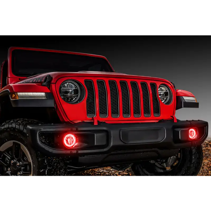 Red Jeep Wrangler JL/Gladiator JT with LED fog light in dirt