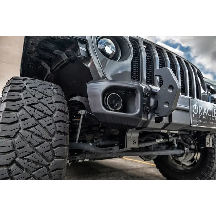 Close-up of Oracle Jeep Wrangler JL/Gladiator JT Sport with bumper-mounted LED fog lights.