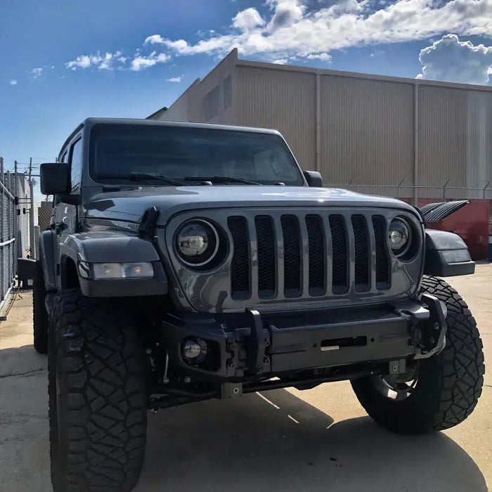 Oracle Jeep Wrangler JL/Gladiator JT Sport High Performance W LED Fog Lights - No Halo featuring a jeep with big tire and bumper