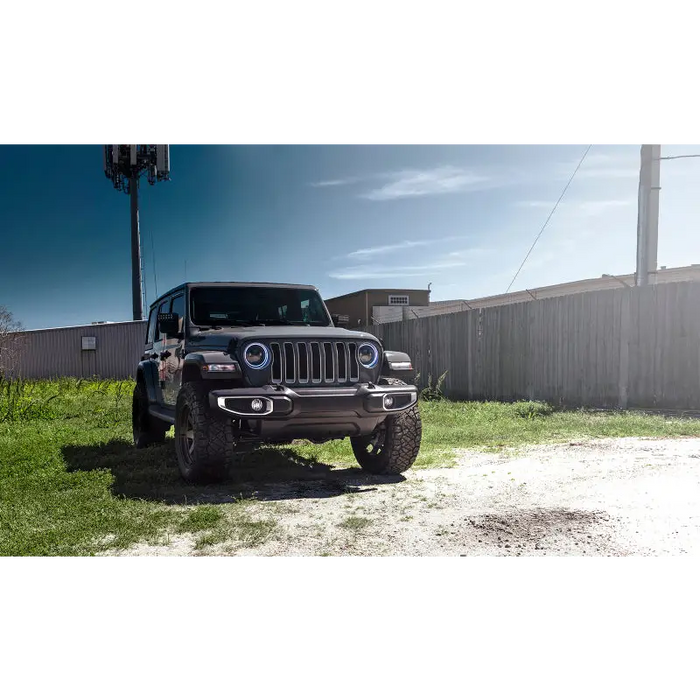 Oracle Jeep Wrangler JL/JT 7in. High Powered LED Headlights - ColorSHIFT with jeep parked in yard