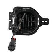 Black and white connector connected to a socket in Oracle Jeep Wrangler LED fog lights.
