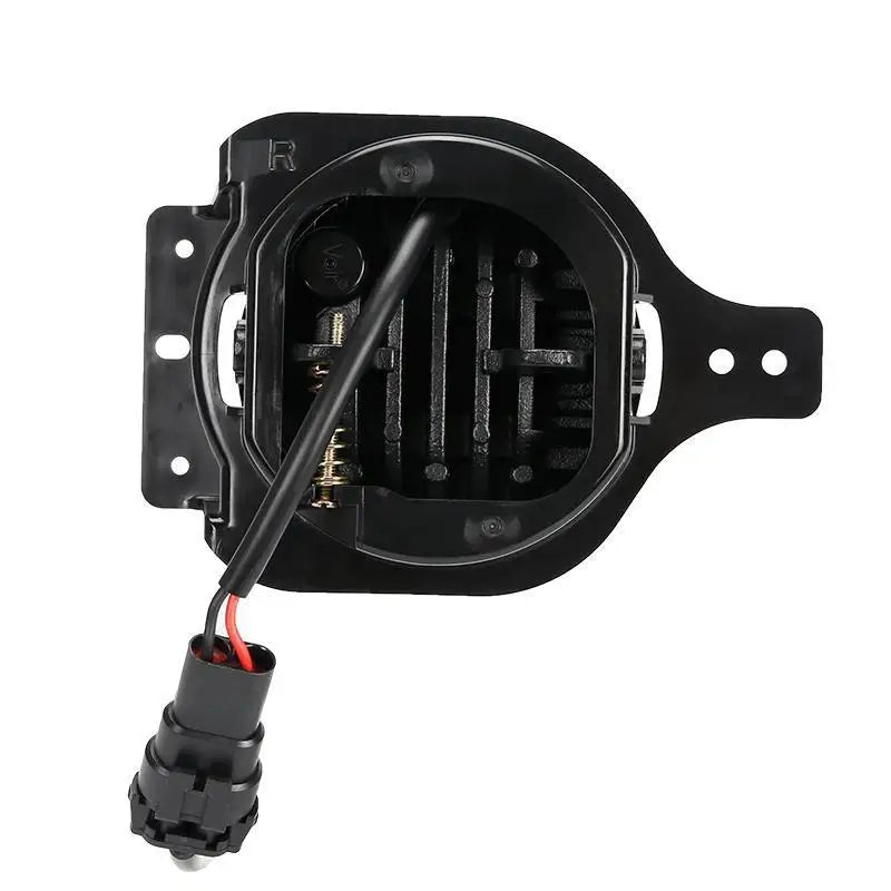 Black and white connector connected to a socket in Oracle Jeep Wrangler LED fog lights.