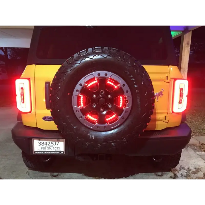 Yellow Jeep with red LEDs on Oracle LED Illuminated Wheel Ring 3rd Brake Light - Red