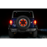 Jeep with illuminated wheel ring 3rd brake light and tire cap.