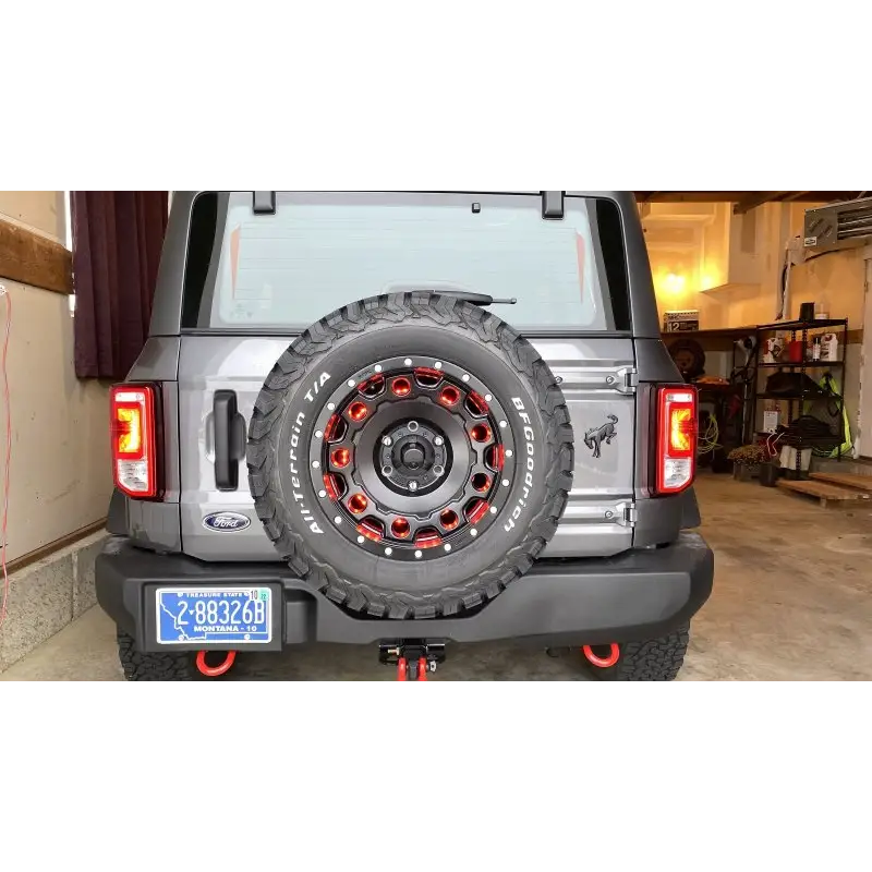 Jeep with tire cover featuring Oracle LED Illuminated 3rd Brake Light