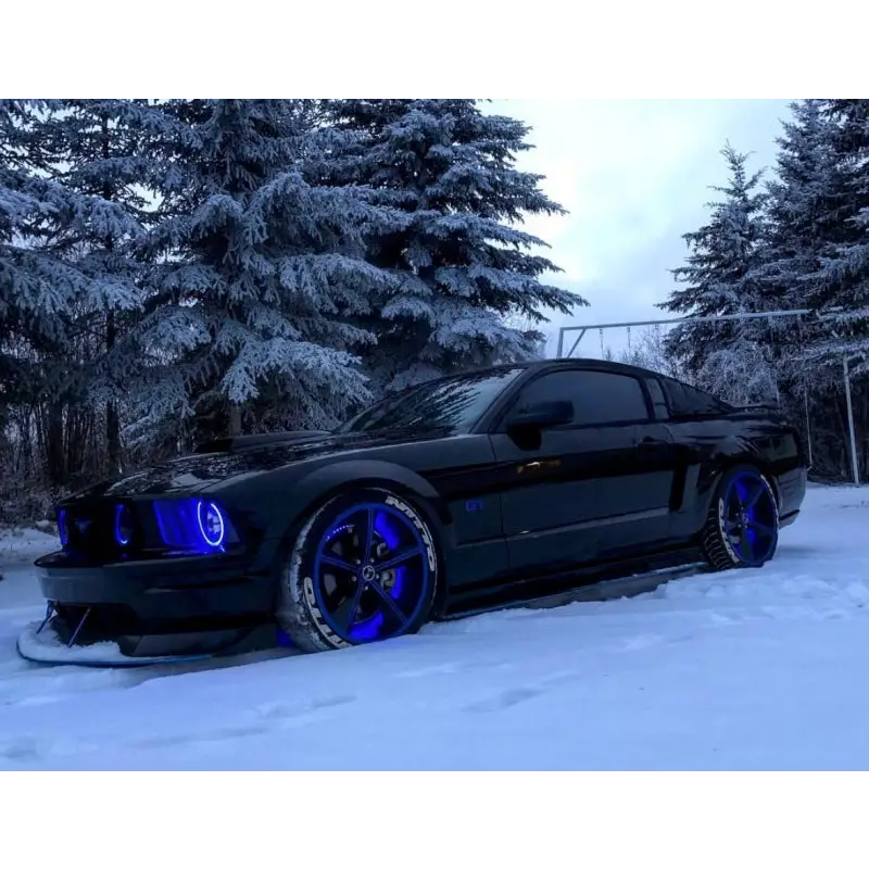 Black Mustang with blue lights in snow - Oracle LED Illuminated Wheel Rings ColorSHIFT - 15in