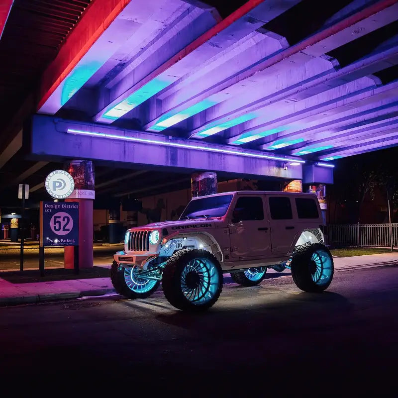 White Jeep with Blue LED Wheel Rings from Oracle - ColorSHIFT Dynamic