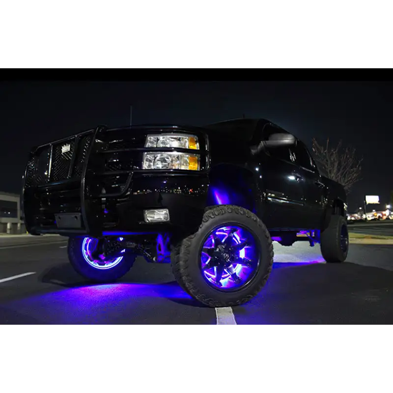 Black truck with purple LED wheel rings from Oracle LED Illuminated Wheel Rings - ColorSHIFT Dynamic.