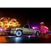 White LED wheel ring kit with truck parked by carnival