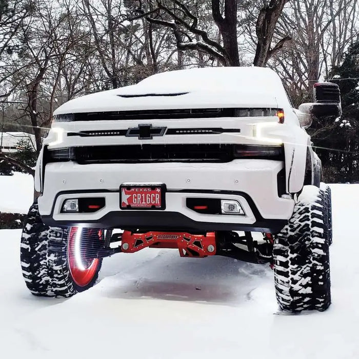 White truck with red tire featuring Oracle LED Illuminated Wheel Rings - Double LED - White.