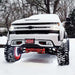 White truck with red tire featuring Oracle LED Illuminated Wheel Rings - Double LED - White.