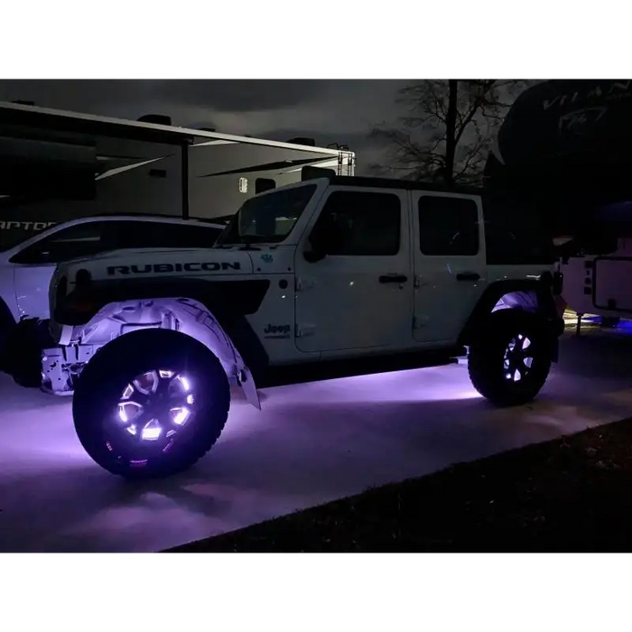 Oracle LED Illuminated Wheel Rings - White on white Jeep with purple lights